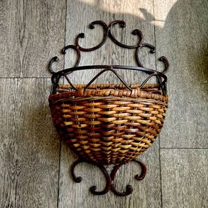 Vintage antique metal  finish and wicker pocket style hanging 14 1/2” planter.